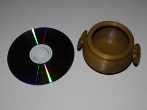 cauldron with a cd